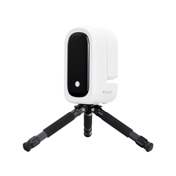 A white and black SeeStar S50 Pro mounted on a small black tripod, shown against a solid white background. | Seestar S50 PRO Smart Telescope
